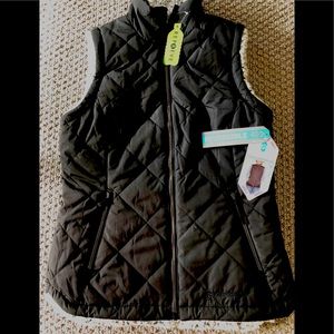 Reversible Insulated Vest.. Faux fur lined. Repreve